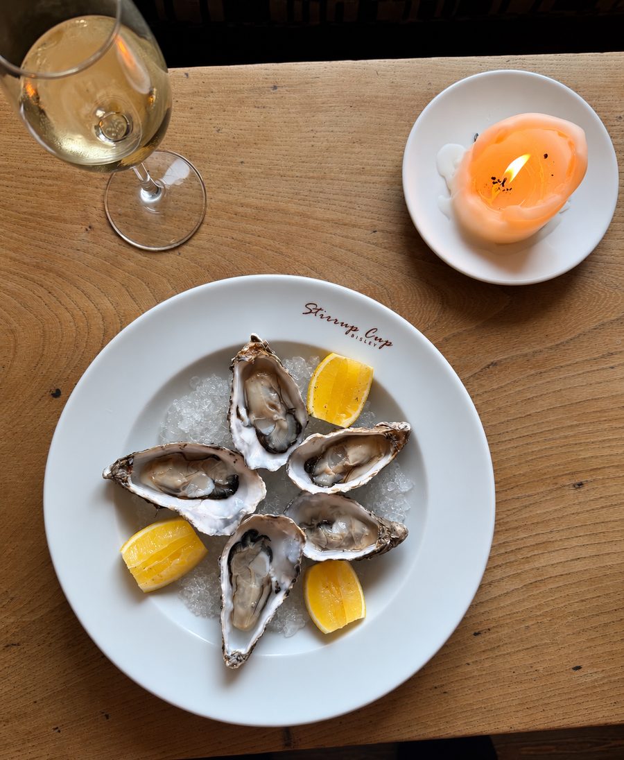 Hand-caught Cornish oysters on crushed ice with lemon at The Stirrup Cup in Bisley, near Stroud.